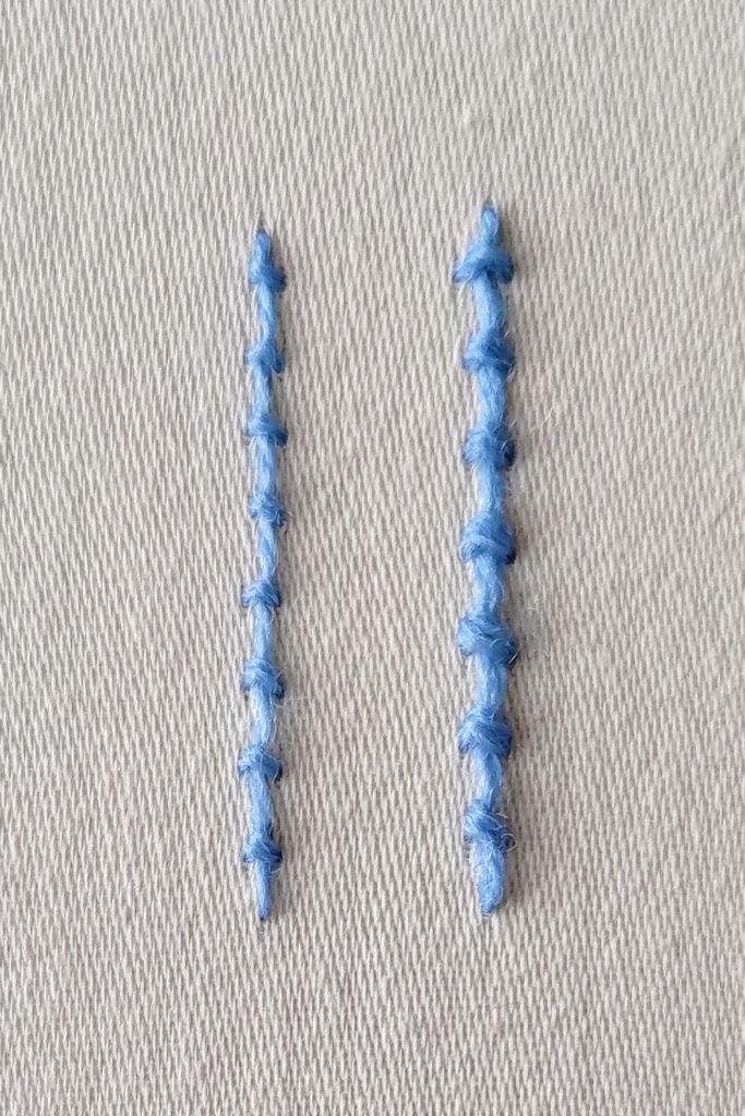 On the left is a line of coral stitch in 1 strand of crewel wool, on the right is a line stitched with 2 strands.