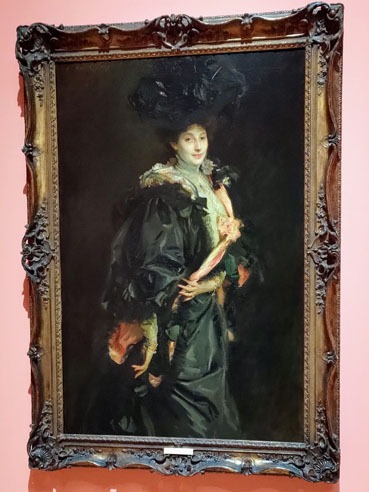 Portrait of Lady Sassoon wearing a black opera cloak by Sargent.